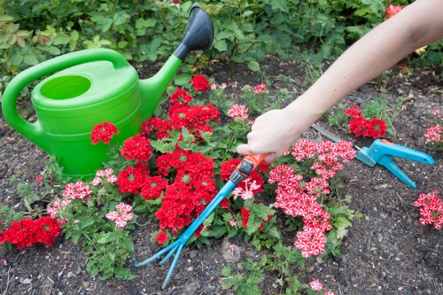 Gardeners Mitcham team working safely with tools